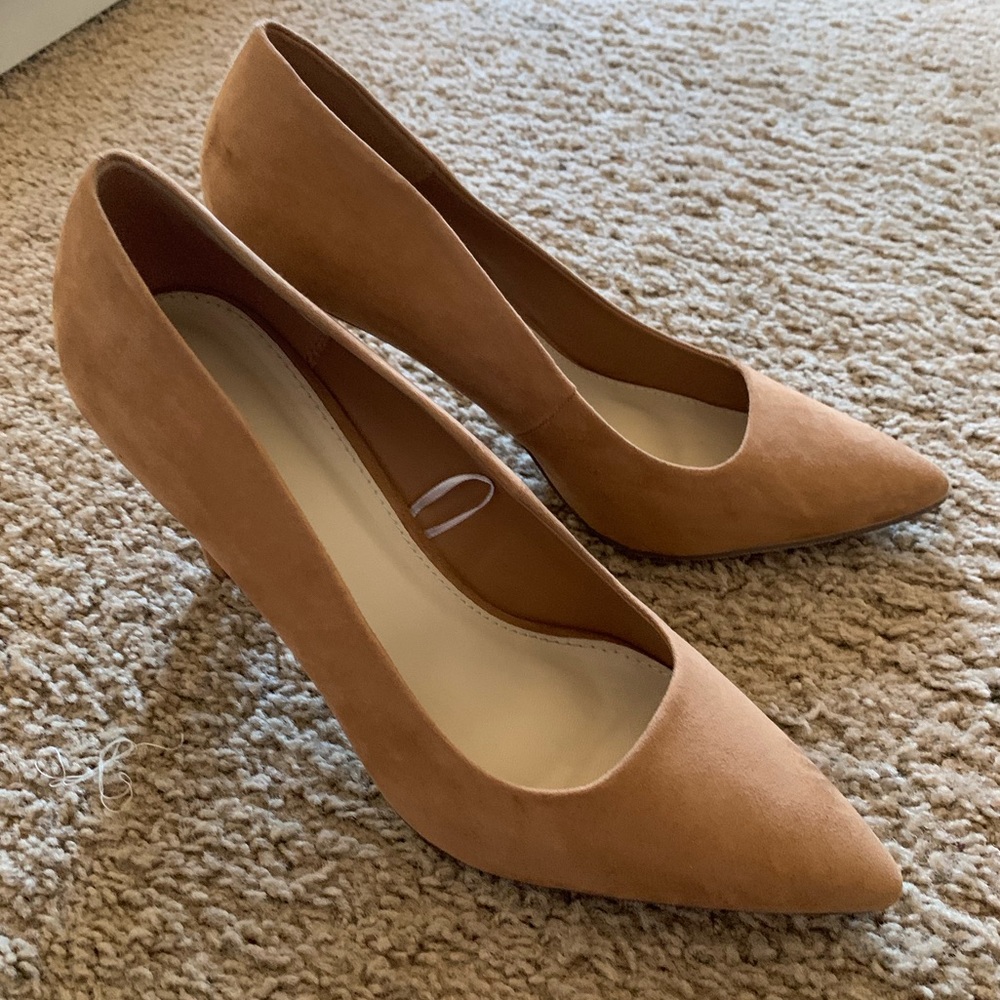 Nude suede like heels. Worn once!